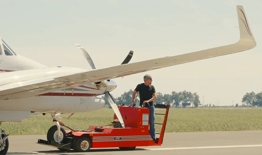 Tug positioning a King Air on the ramp